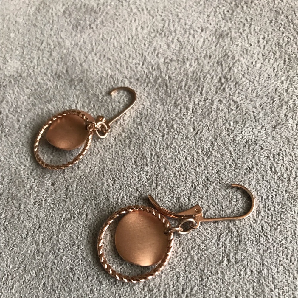 Rose gold colored earrings